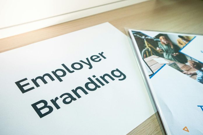Magyar nagyvállalatok kommunikációja: iparági konszolidáció — Focus on employer branding with documents on a wooden desk, ideal for business c