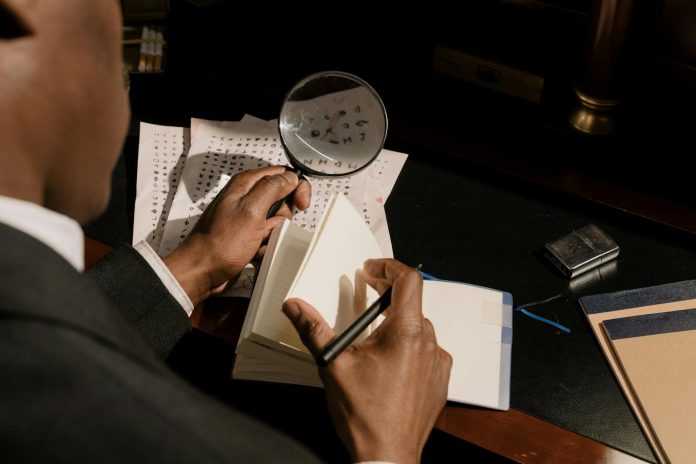 Mészáros-csoport — V-Híd Zrt. — A detective examines encrypted documents with a magnifying glass in moody lighti
